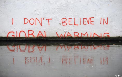 A work by street artist Banksy with the words 'I DON'T BELIEVE IN GLOBAL WARMING'
